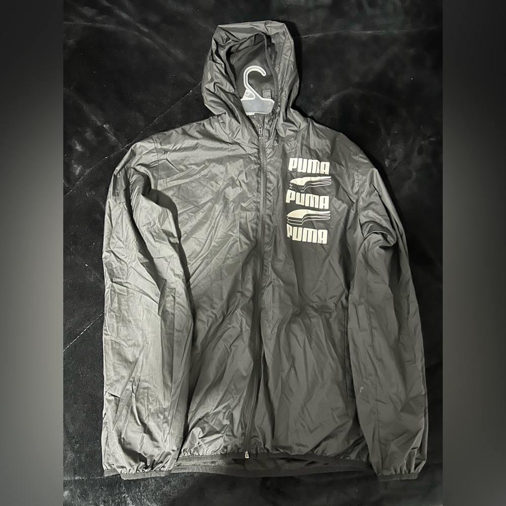 large grey puma windbreaker